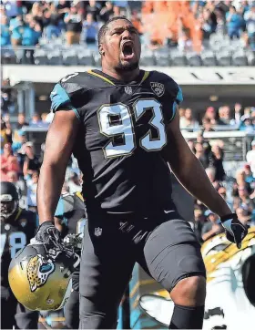  ??  ?? Jaguars defensive end Calais Campbell was named NFL defensive player of the year on Wednesday. JASEN VINLOVE/USA TODAY SPORTS