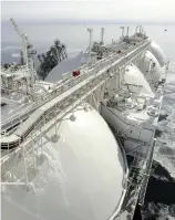  ?? Yomiuri Shimbun file photo ?? Liquefied natural gas from the Sakhalin 2 project is stored in tanks on a vessel in Russia in February 2009.