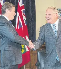  ?? ANDREW FRANCIS WALLACE TORONTO STAR ?? John Tory and Doug Ford were all smiles Thursday before their meeting to discuss issues facing the city under its new council.