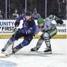  ?? GARY LLOYD MCCULLOUGH/FOR THE ICEMEN ?? Jacksonvil­le Icemen forward Matheson Iacopelli (19) looks to shoot against the Everblades in a January game.