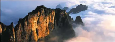  ??  ?? Wangmang mountain, surrounded by clouds, is the birthland of many Chinese ancient tales.