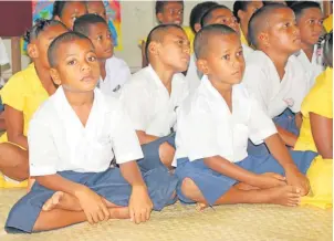  ?? Photo: JOSAIA RALAGO ?? Students listen keenly to the discussion­s on the National Developmen­t Plan during the public consultati­on on Vatoa Island in the Lau Group.