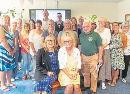  ?? Picture: Kim Cessford. ?? Professor Dawn Brooker, front left, and Dr Shirley Evans with the people who attended the launch at Kirrie Connection­s.