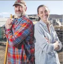  ?? MIKAELA MACKENZIE/ CALGARY HERALD ?? Paul Hughes and Amanda Weightman of Grow Calgary grow produce for the city’s food bank.