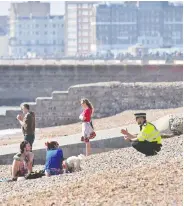  ?? GLYN KIRK/AFP VIA GETTY IMAGES ?? As the U.K. coronaviru­s death toll nears 9,000, people are being urged to stay away from beaches and parks.