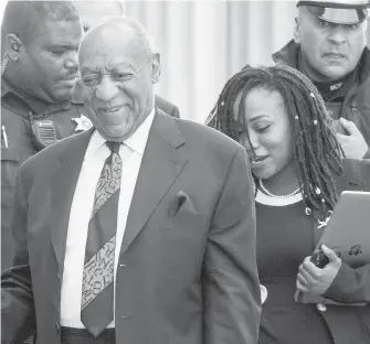  ??  ?? Bill Cosby exits the Montgomery County Courthouse after a pretrial hearing in a sexual assault case Tuesday in Norristown, Pennsylvan­ia.
