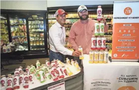  ?? MICHAEL SEARS/MILWAUKEE JOURNAL SENTINEL ?? Qasim Khan (left) and his brother Asim Khan launched a line of curcuminin­fused beverages, ZYN, in November.