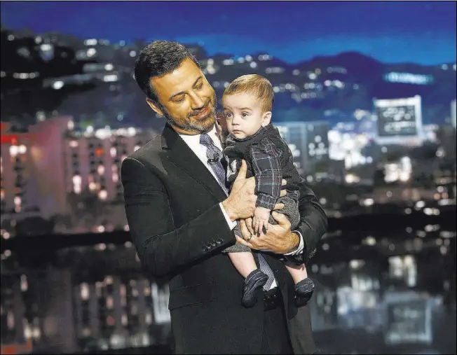  ?? Randy Holmes ABC ?? Jimmy Kimmel, with son, Billy, called for coverage for those with pre-existing conditions and for gun control after the Route 91 Harvest festival shootings.