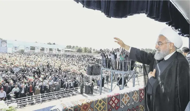  ?? PICTURE: GETTY IMAGES ?? 0 President Hassan Rouhani addresses crowds during a rally in the northweste­rn city of Sabzevar yesterday