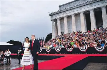  ?? Mandel Ngan AFP/Getty Images ?? PRESIDENT TRUMP and First Lady Melania Trump at the “Salute to America” event in Washington.