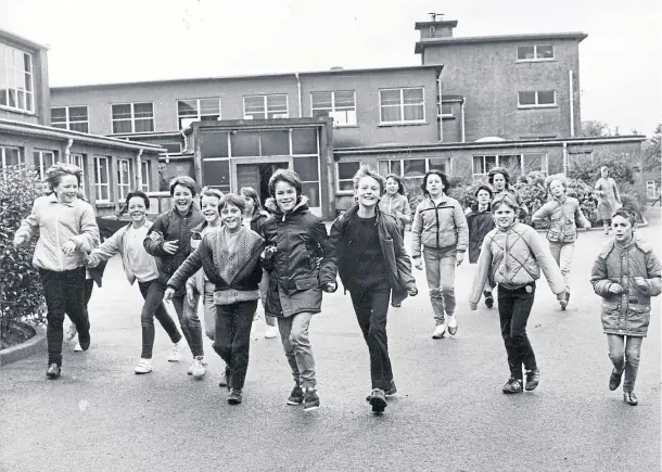  ??  ?? STEPPING UP: A group of pupils at Aberdeen’s Westerton Primary take part in a sponsored walkabout in October 1984 to raise cash for the children’s cancer charity Calico