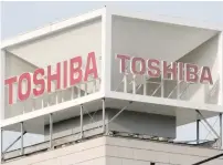  ?? — AFP ?? The logo of Japan’s Toshiba is displayed at the company’s headquarte­rs in Tokyo.