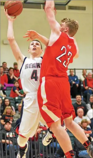  ?? PHOTOS BY KYLE MENNIG – ONEIDA DAILY DISPATCH ?? Chittenang­o’s Zach Falkenburg (4) takes an inside shot as Vernon‑Verona‑Sherrill’s Davey Moffett (23) defends during their Section III Class B semifinal in Syracuse on Saturday.