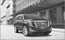  ?? COURTESY OF CADILLAC VIA AP ?? The 2018 Cadillac Escalade is powered by a 6.2-liter V8 with 420 horsepower and starts around $74,000.