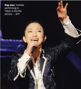  ??  ?? Pop star: Yoshida performing in Tokyo in this file picture. — AFP