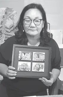  ?? Photo by Ma. Elena Catajan ?? THE ARTIST. The artist at her home, doing her jeepney art cards as a homage to the iconic Philippine mode of transporta­tion now facing phase-out.