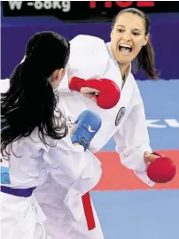  ?? BILD: SN/GEPA/ OBERLÄNDER ?? Alisa Buchinger, die Nummer eins der Karate-Welt.
