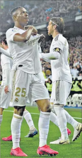  ?? AFP ?? Real Madrid's Brazilian forward Vinicius Junior celebrates his goal against Barcelona in their La Liga n clash at the Santiago Bernabeu stadium on Sunday.
SEASON
CLUB