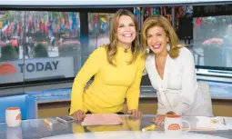  ?? CHARLES SYKES/INVISION 2018 ?? Savannah Guthrie, left, and Hoda Kotb on the “Today” set.