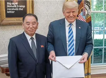  ??  ?? Big deal: Donald Trump receives the letter