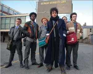  ??  ?? The film cast of Sing Street. Below, Clark with his bandmates in Danny Wilson