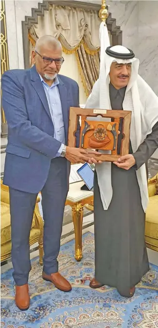  ?? Photo: Fiji Muslim League ?? Fiji Muslim League National president Hafizud Khan (left), with the president of Islamic Developmen­t Bank, Dr Bandar Hajjar in Jeddah, Saudi Arabia.