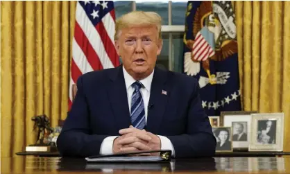  ??  ?? Donald Trump addresses the nation from the Oval Office of the White House, 11 March 2020. Photograph: Reuters