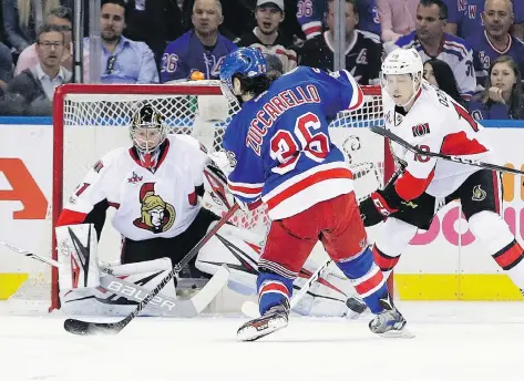  ?? FRANK FRANKLIN II/THE ASSOCIATED PRESS ?? New York Rangers right wing Mats Zuccarello scores on Ottawa Senators goaltender Craig Anderson in Game 3 of their Eastern Conference semifinal on Tuesday in New York. The Senators lost 4-1, and now lead the best-of-seven series 2-1.