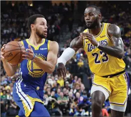  ?? ETHAN MILLER — GETTY IMAGES ?? The Golden State Warriors with Stephen Curry, left, and the Los Angeles Lakers with LeBron James are respective­ly the fourth- and fifth-most-valuable pro sports teams in the U.S.