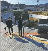  ??  ?? A former police station destroyed by the tsunami is seen in Onagawa, Japan.