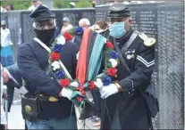  ?? MEDIANEWS GROUP FILE PHOTO ?? Members of the Third Regiment Infantry, United States Colored Troops Civil War re-enactors placed a wreath at the Civil War marker of the Delaware County Veterans Memorial on Juneteenth 2020.