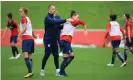  ??  ?? Mark Sampson is shrugged off by Lucy Bronze in an England training session. Photograph: Mike Egerton/PA