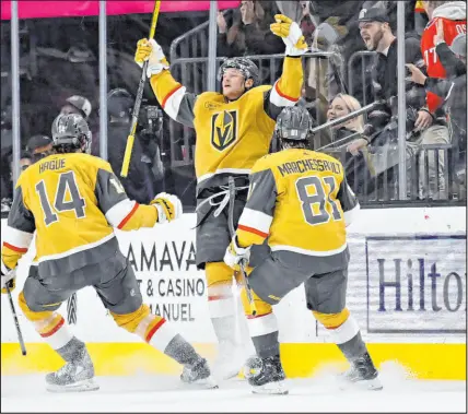  ?? ?? Center Jack Eichel celebrates a nifty third-period goal that gave the Knights a 2-1 lead with 4:37 remaining in regulation. Roope Hintz scored the equalizer for Dallas in the final minute.