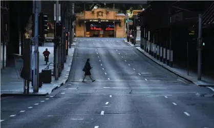  ?? Photograph: Mick Tsikas/AAP ?? A nearly empty Market Street in Sydney’s central business district amid the Covid-19 crisis. Lockdowns have taken a toll on business confidence.