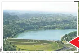  ??  ?? DANGER ZONE: Water from Guajataca Lake flows down the spillway around the ready-to-burst Guajataca Dam on Saturday as officials sought to evacuate hundreds of residents from the potential flood.