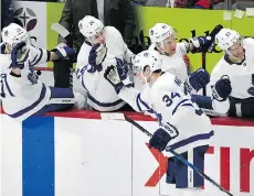  ?? JOSE JUAREZ/THE ASSOCIATED PRESS ?? Toronto’s Auston Matthews celebrates scoring the winner with 30 seconds left in Detroit on Sunday.