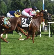  ?? NYRA ?? Glorious Empire (background) with Julien Leparoux aboard with Joel Rosario aboard Channel Maker (2) on the outside in a dead heat in last year’s Bowling Green Stakes (G2) at Saratoga Race Course.