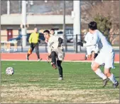  ?? Tim Godbee ?? Edward Soto sends a pass across the field as the Jackets hosted Coahulla Creek, Friday. Soto led Calhoun in scoring with two goals in the 3-3 tie.