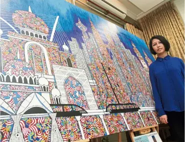  ?? — AZLINA abdullah/the Star ?? Wan Jamila, an artist with autism, is part of art Includes Festival’s visual art exhibition programme.