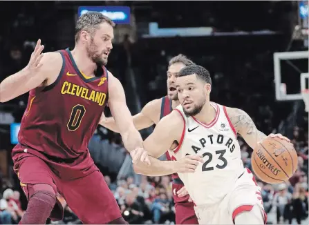  ?? ASSOCIATED PRESS FILE PHOTO ?? Toronto Raptors' Fred VanVleet drives against Cleveland Cavaliers' Kevin Love during an National Basketball Associatio­n game on Wednesday night.