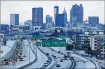  ?? SPINK / JSPINK@AJC.COM JOHN ?? Atlanta’s roads were unusually empty for a few days last week.