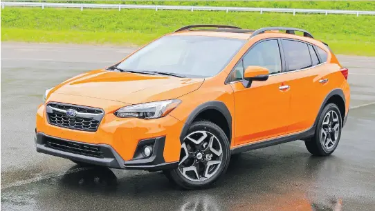  ?? PHOTOS: GRAEME FLETCHER/DRIVING ?? The 2018 Subaru Crosstrek has a wider stance and a sweeping roofline similar to the funky concept shown at the Geneva Motor Show in 2016.