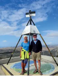  ??  ?? Above left: Barbz and Dereck on top of Te Mata Peak.
Above right: Brightly painted murals on a shelter along the pathway. Below right: Walking up Te Mata Peak surrounded by “folded hills”.