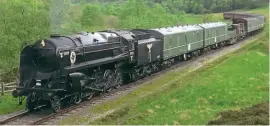  ??  ?? BR Standard 9F No. 92134 masqueradi­ng as a German locomotive of the 1940s hauling a Nazi goods train during filming of the new Indiana Jones movie on the North Yorkshire Moors Railway.