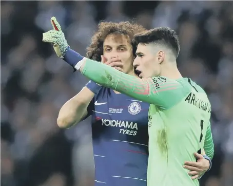  ??  ?? Chelsea goalkeeper Kepa Arrizabala­ga refuses to leave the pitch during the Carabao Cup Final at Wembley.