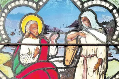  ?? AP ?? A detail of a nearly 150-year-old, stained-glass window depicts Christ speaking to a Samaritan woman, in the now-closed St Mark’s Episcopal Church in Warren, Rhode Island.