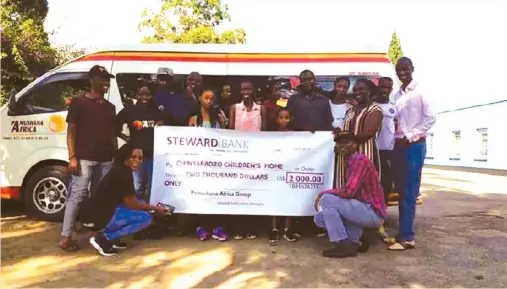  ??  ?? Pamushana Africa patrons with their donation to Chinyaradz­o Children's Home