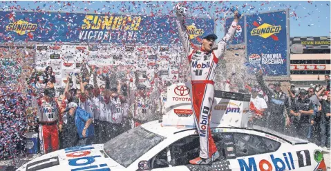  ?? KYLE TERADA, USA TODAY SPORTS ?? Kevin Harvick celebrates in victory lane after winning the Toyota/ Save Mart 350 for his first victory since last October.