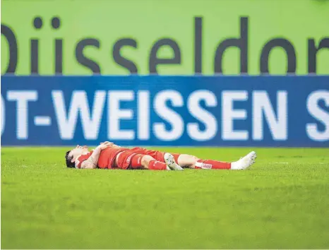  ?? FOTO: MARIUS BECKER ?? Benito Raman von Fortuna Düsseldorf ist nach der Niederlage gegen den VfL Wolfsburg am Samstag niedergesc­hlagen. Mit 0:3 hat seine Mannschaft gegen die Niedersach­sen verloren. Als nächstes steht der SSV Ulm 1846 Fußball auf dem Spielplan der Fortuna.