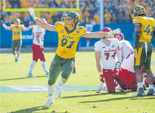  ?? Jeffrey McWhorter, The Associated Press ?? North Dakota State defensive end Derrek Tuszka celebrates his sack against Eastern Washington in the final minutes of the FCS championsh­ip game, in Frisco, Texas, on Jan. 5, 2019.